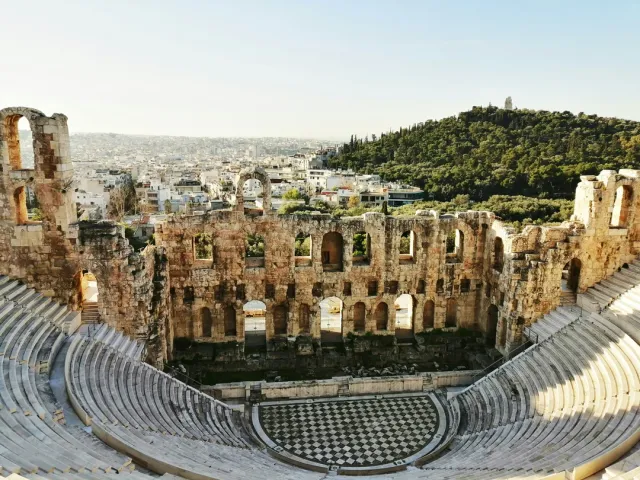 Acropolis, Parthenon and the historic Plaka neighborhood. Sunset Acropolis tours with rooftop Greek dinners available.