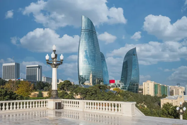 Icherisheher (Old City) with Maiden Tower and Shirvanshah's Palace, plus modern Flame Towers and Baku Boulevard. Evening skyline tours recommended.