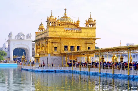 Golden Temple, Amritsar — illuminated shrine reflected in the holy tank