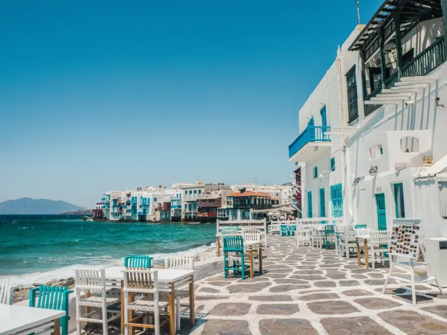 Mykonos nightlife and windmills; Crete's Knossos Palace and Samaria Gorge hikes. Culinary and beach-club options included.