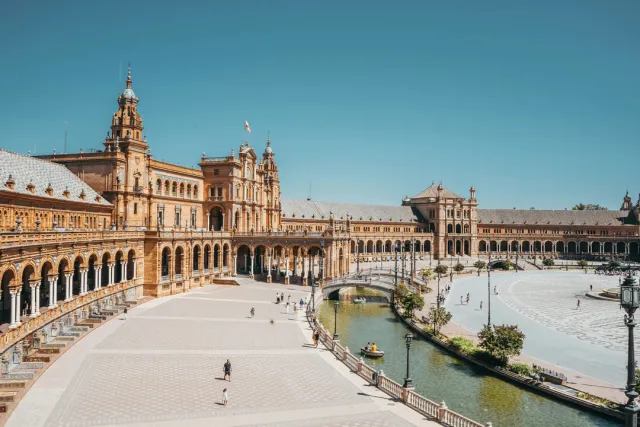 Seville & Granada – Andalusian Charm Seville's Alcázar, Cathedral and Triana's flamenco spirit; Granada's Alhambra and Albaicín. Safari Sutra Pro Tip: Join our Alhambra night tour for magical views.