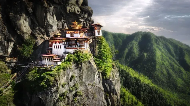 Hike to the iconic cliff-hanging Taktsang Monastery. We offer guided treks with traditional hot stone baths afterward!