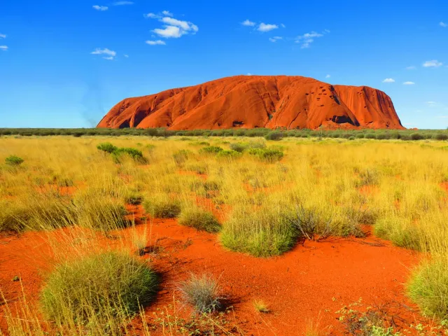 Uluru and Kata Tjuta with Aboriginal cultural experiences, sunrise tours and outback camping under starry skies.