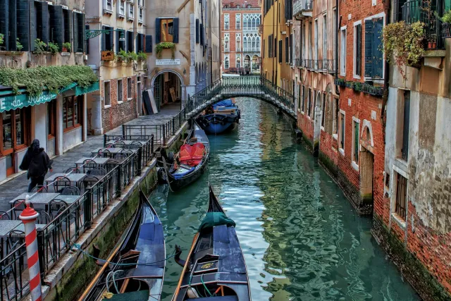 St. Mark's Square, Doge's Palace and romantic gondola rides; Murano glass and Burano's colorful houses. Private canal tours and Venetian mask workshops available.